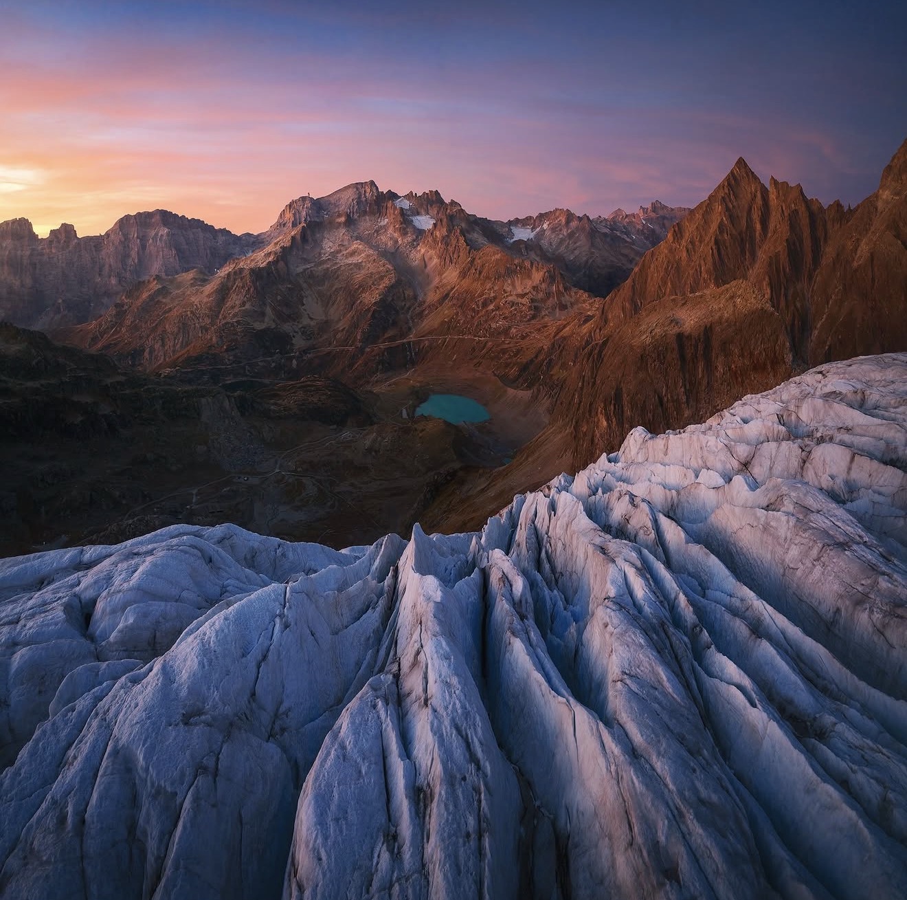 High glacier and Andean peaks in rose-coloured evening light