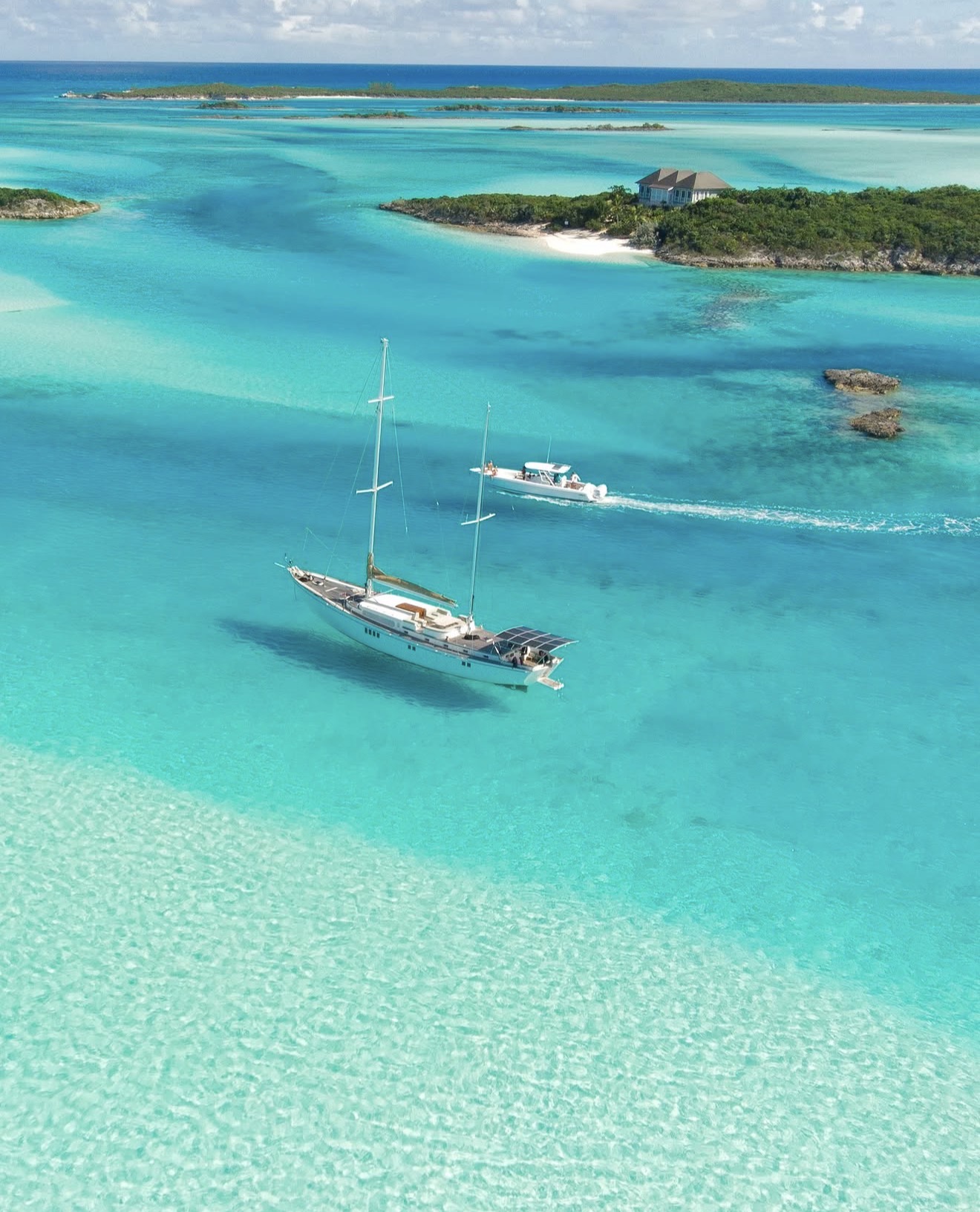 Sailing yacht in clear turquoise Caribbean water