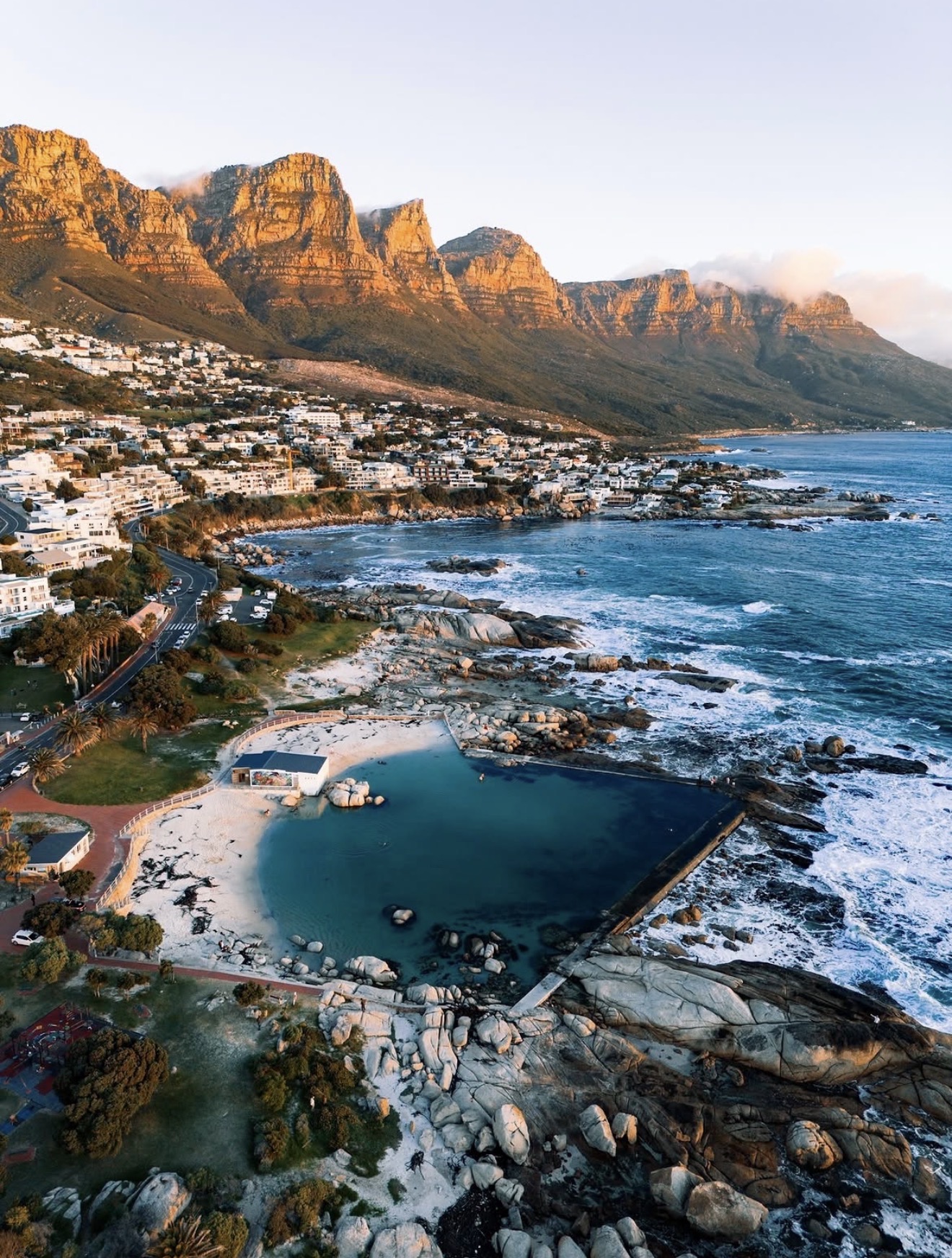 Camps Bay coastline beneath the Twelve Apostles at golden hour