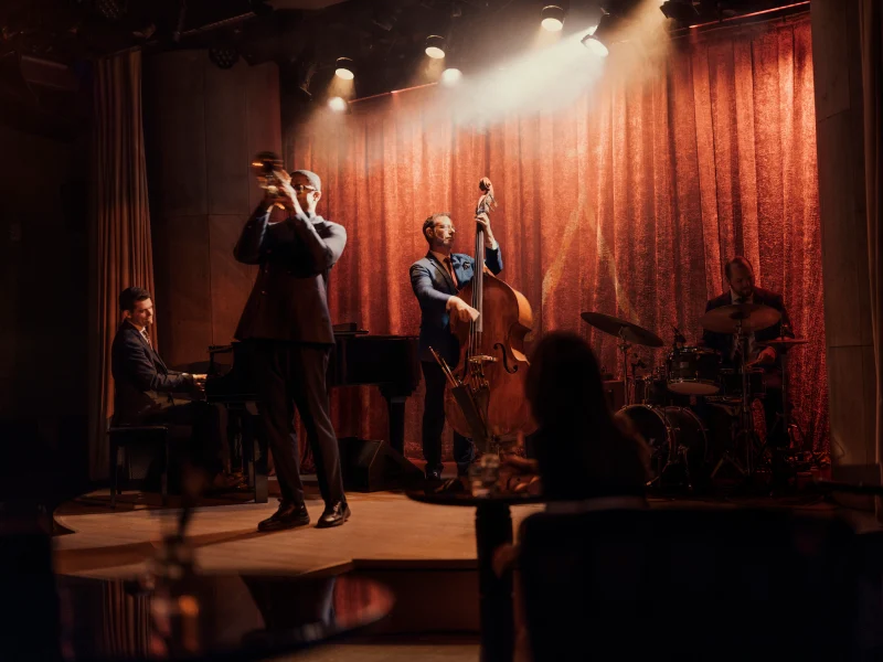 Intimate live jazz performance in a warmly lit New York salon