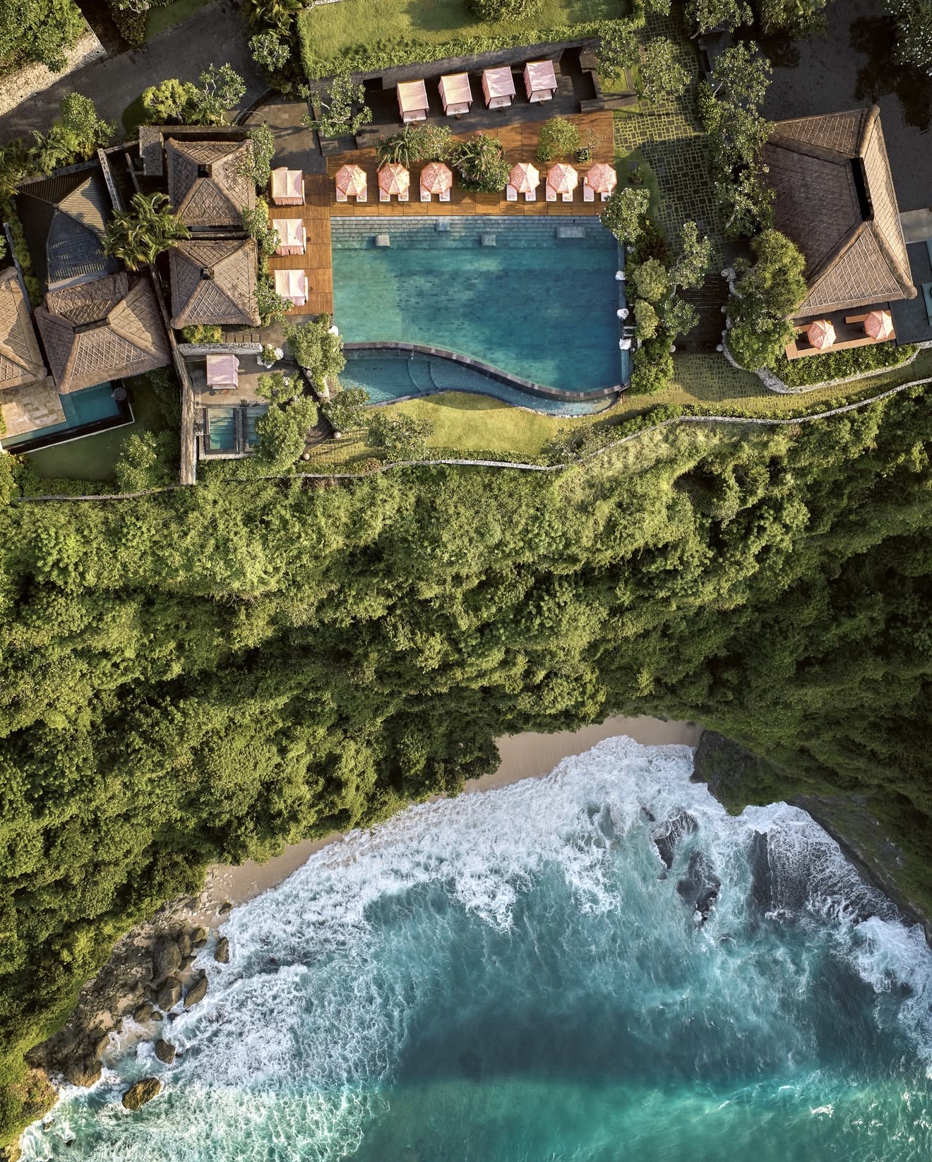 Aerial view of a secluded clifftop pool above the Indian Ocean
